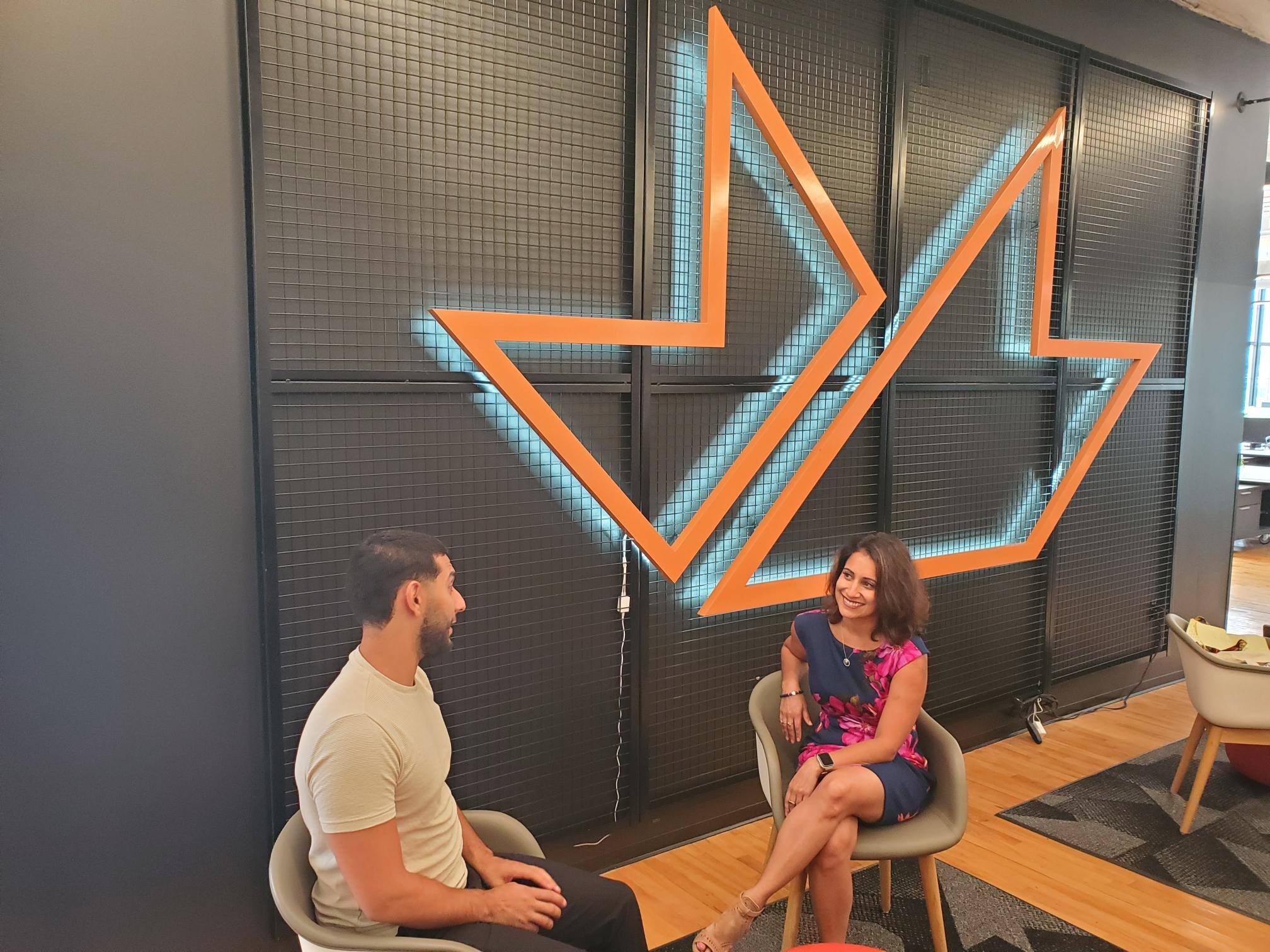 Monica Vajani, Executive Director of the mHUB MedTech Accelerator, talks with Ahmad Hammad, Program Manager of the mHUB MedTech Accelerator program for startups